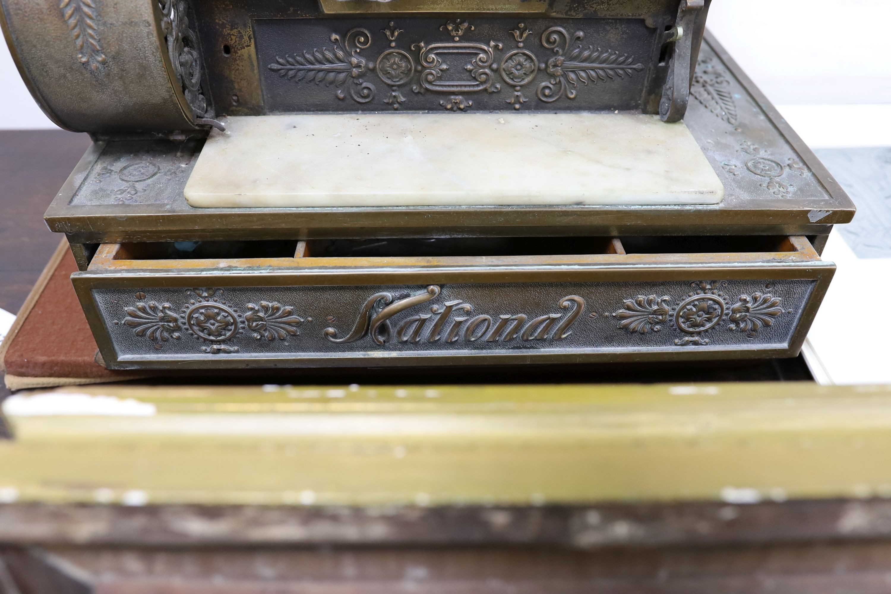 An early 20th century American National cash register, Serial Number 1068452/484, width 47cm, depth 39cm, height 57cm